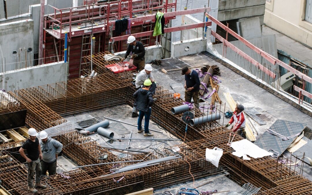 Small crew during construction - How to Save on Your Construction Site ID System